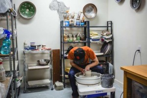 Man working in private ceramic studio