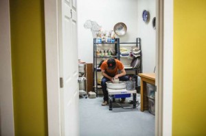 Private ceramic studio viewed through open door